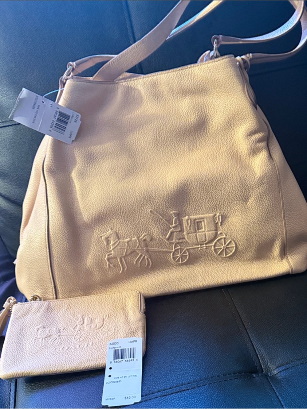 Coach Embossed Carriage Shoulder Tote and matching wallet in Apricot